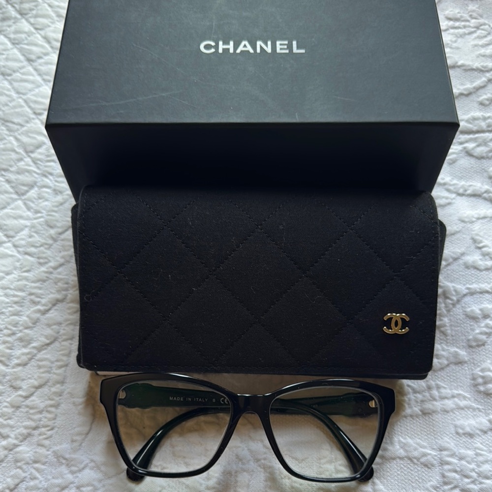 CHANEL Black Glasses Iconic Logo Luxurious Design